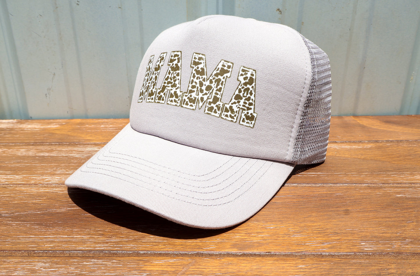 Distressed Cowprint Mama Trucker Hat