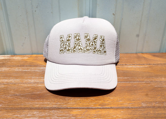 Distressed Cowprint Mama Trucker Hat